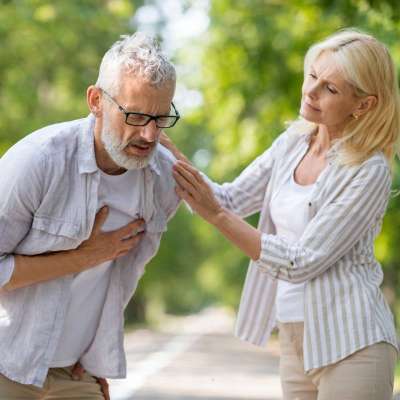 Sudden heart attacks can kill within an hour. Learn the warning signs, causes of acute myocardial ischemia, and how to reduce your risk. Mature Man Suffering Sudden Chest Pain While Walking With Wife In Park, Older Gentleman Having Heart Attack Symptoms, Worried Caring Woman Supporting Her Husband Feeling Unwell Outdoors, Closeup